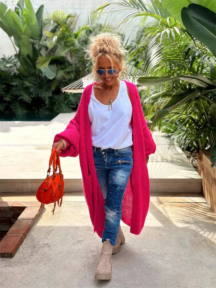 Versatile women's long oversized bohemian cardigan, perfect for layering with 'Love Peace' message.