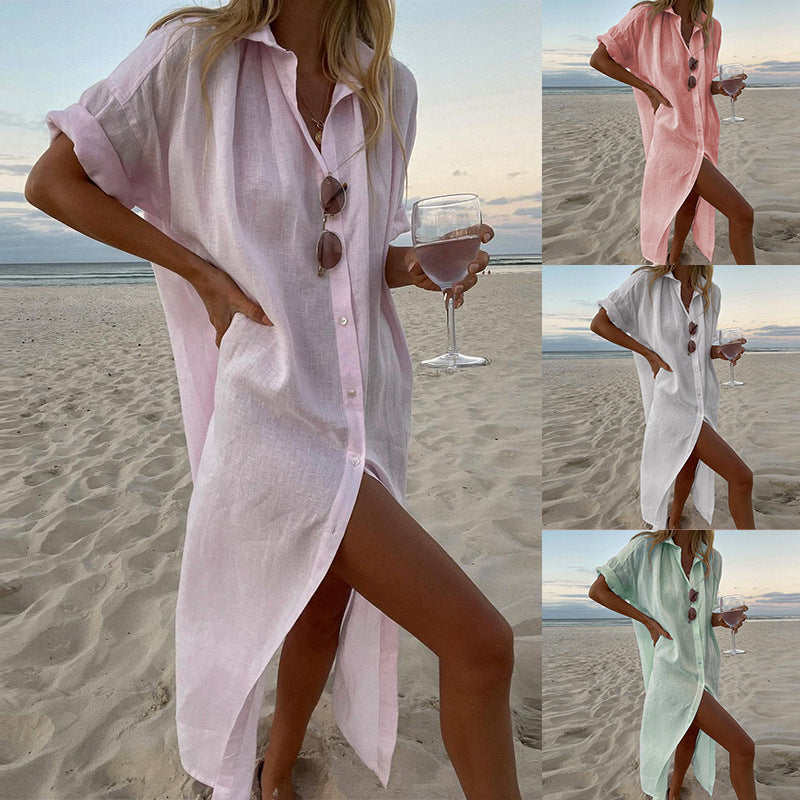 Women's oversized button-down roll-sleeve beach shirt dress, perfect as a cover-up or casual summer wear.