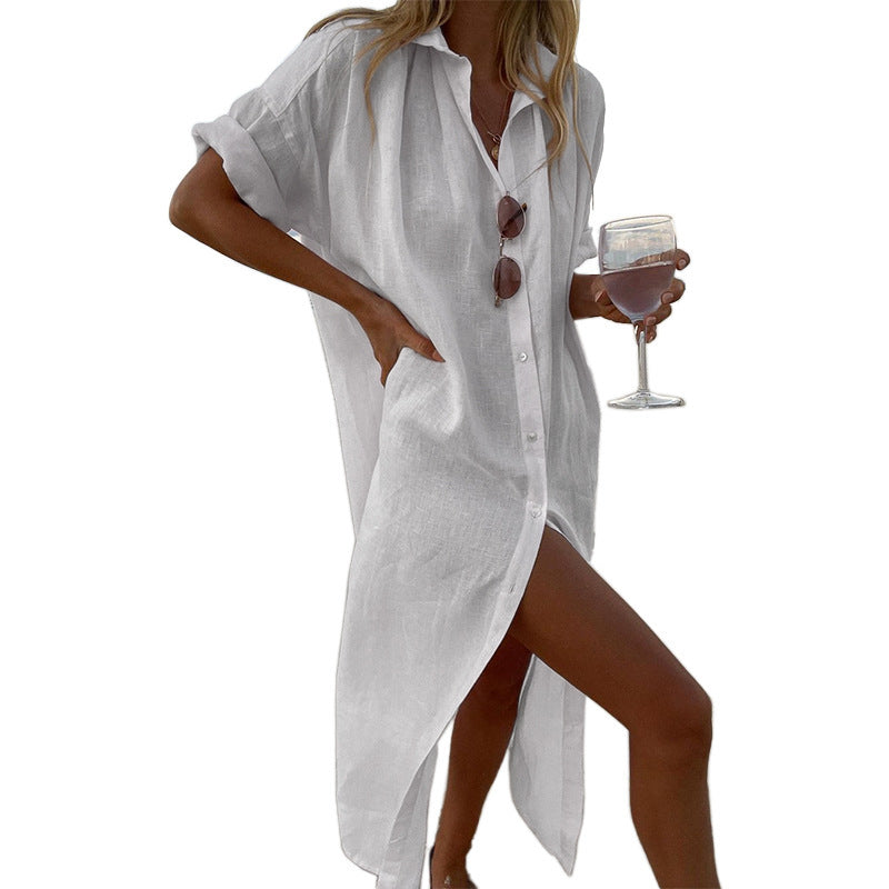 Women's oversized button-down shirt dress. Roll-sleeve beach cover-up, great for summer fashion & resort vacations.
