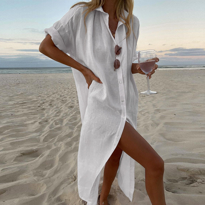 Lightweight women's oversized button-down shirt dress featuring roll sleeves, perfect as a beach cover-up or summer dress.