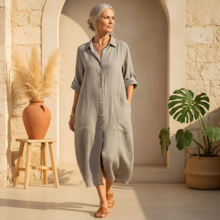 Women's oversized button-down shirt dress with pockets. Casual midi for summer, relaxed fit.