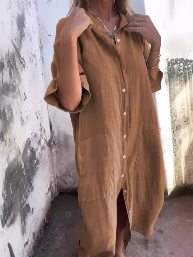 Trendy women's oversized button-down shirt dress with pockets. A versatile, relaxed fit midi for summer & resort.