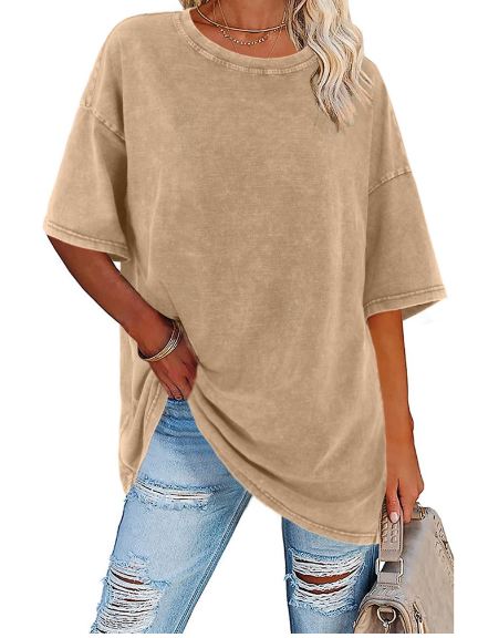 Relaxed fit women's button-down shirt, oversized for comfortable summer and travel wear. Chic & versatile.