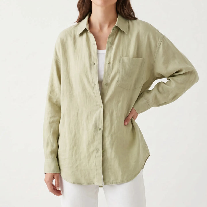 Chic women's oversized button-down shirt. Lightweight, versatile long sleeve top for effortless style.