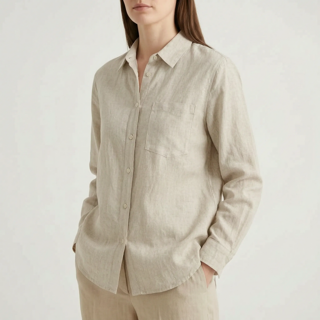 Solid color women's oversized button-down shirt. Comfy, versatile long sleeve top for casual chic apparel.