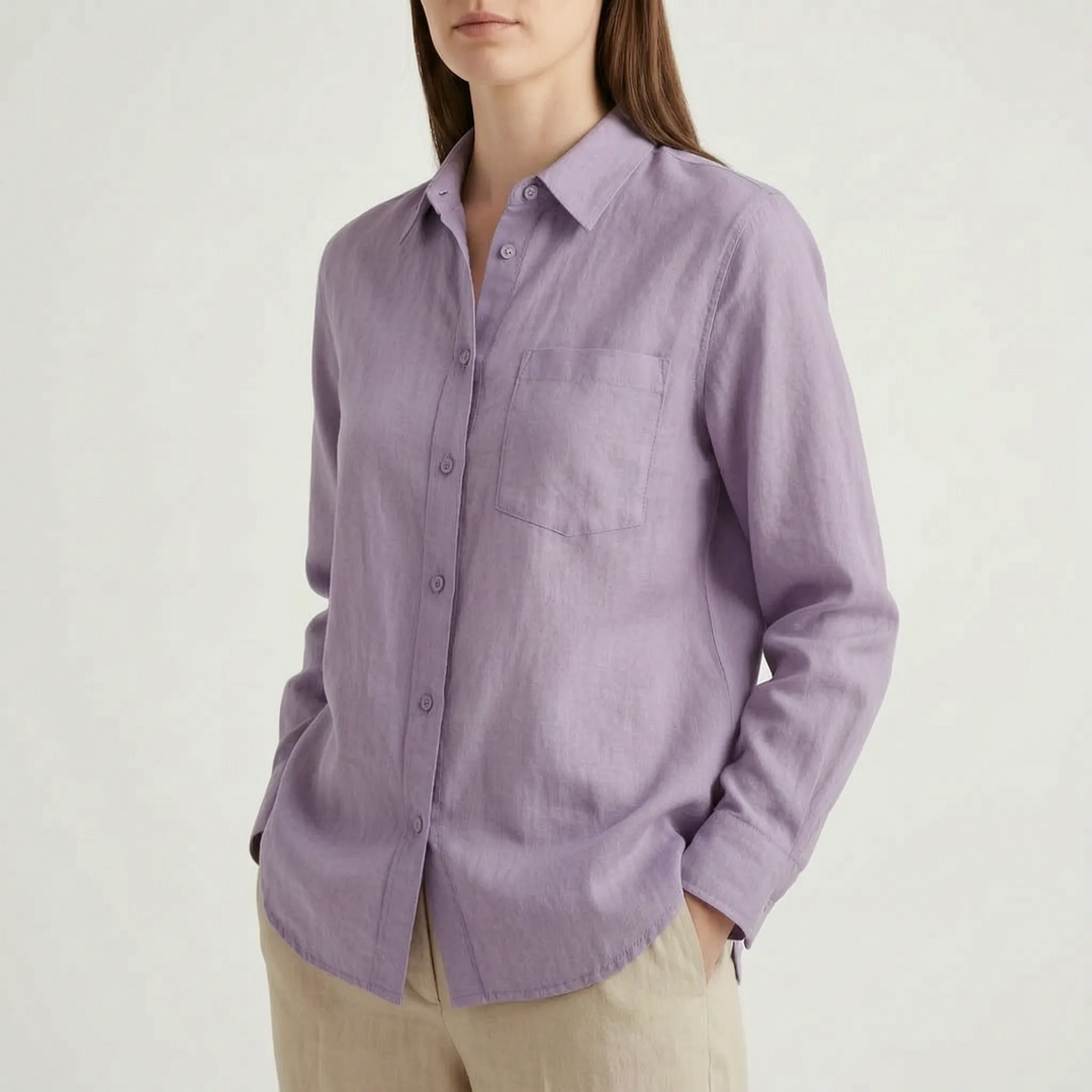 Stylish women's oversized button-down shirt. Relaxed fit, lightweight top for modern summer fashion.