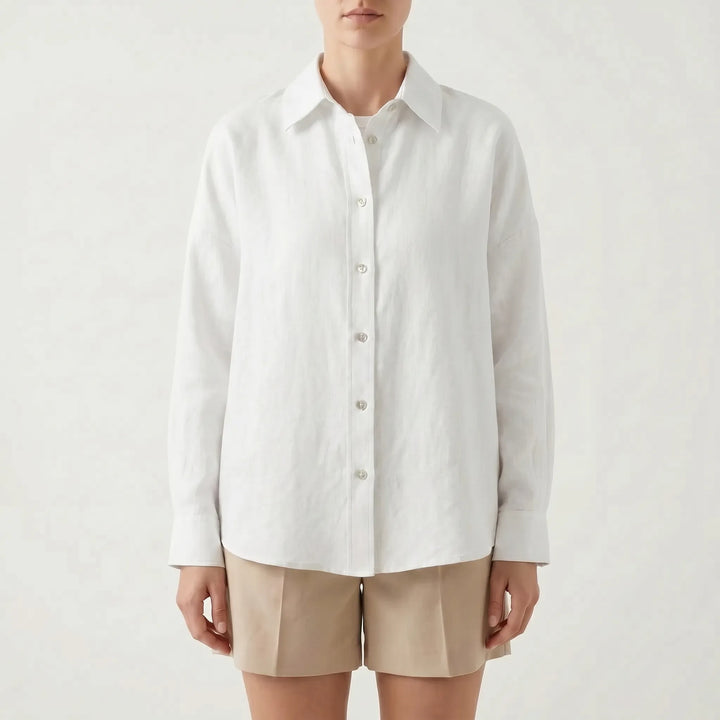 Soft, breathable fabric of an oversized women's button-down shirt, designed for maximum comfort and casual wear.