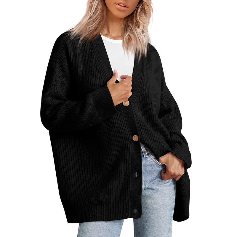 Women's oversized button-up cardigan, perfect for casual layering and comfort in fall & winter.