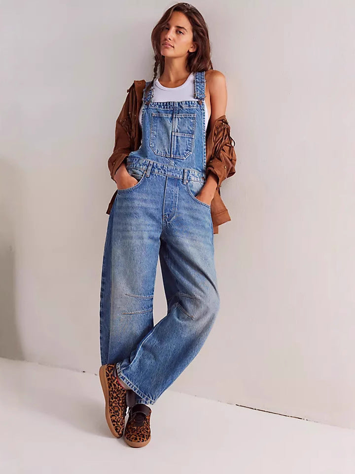 Women's oversized denim overalls with functional pockets, perfect for casual, comfortable everyday streetwear.