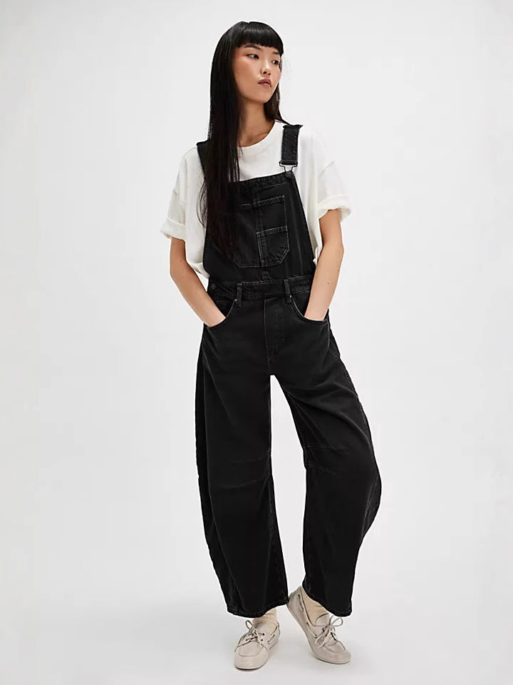 Relaxed fit women's oversized overalls, stylish and versatile for comfortable casual fashion. Features deep pockets.