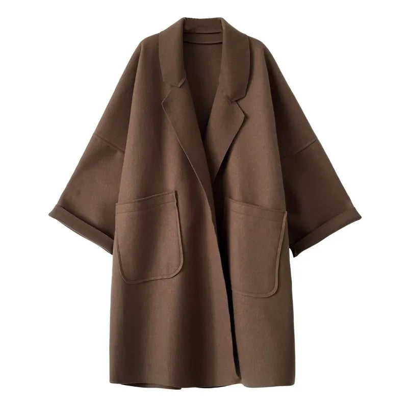 Women's oversized elegant business casual trench coat, a stylish fall fashion outerwear.