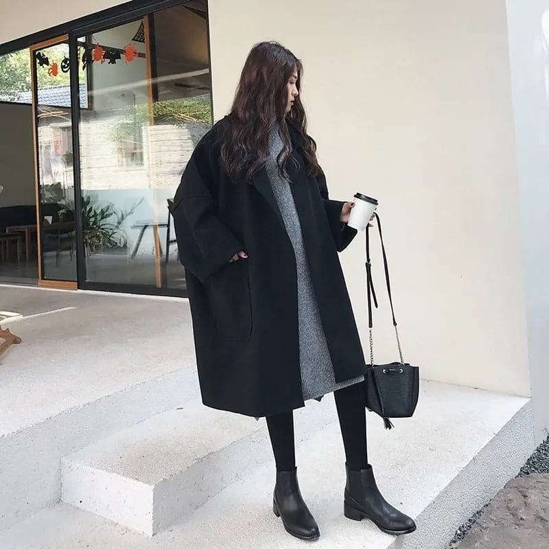 Stylish women's long oversized trench coat, elegant and classic for fall fashion.