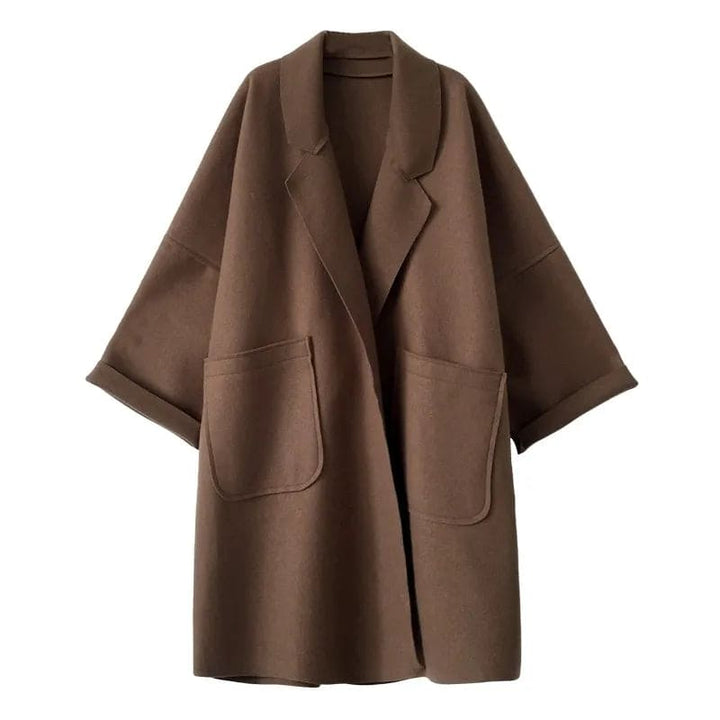 Sophisticated women's long oversized trench coat, stylish for business casual fall fashion.