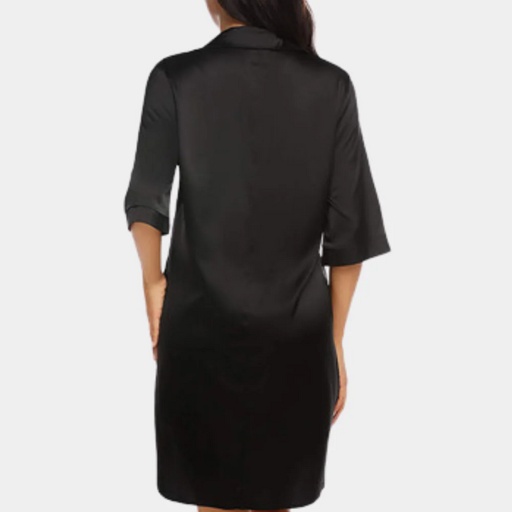 Chic women's oversized half sleeve button-down mini dress, versatile for casual wear or beach cover-up.