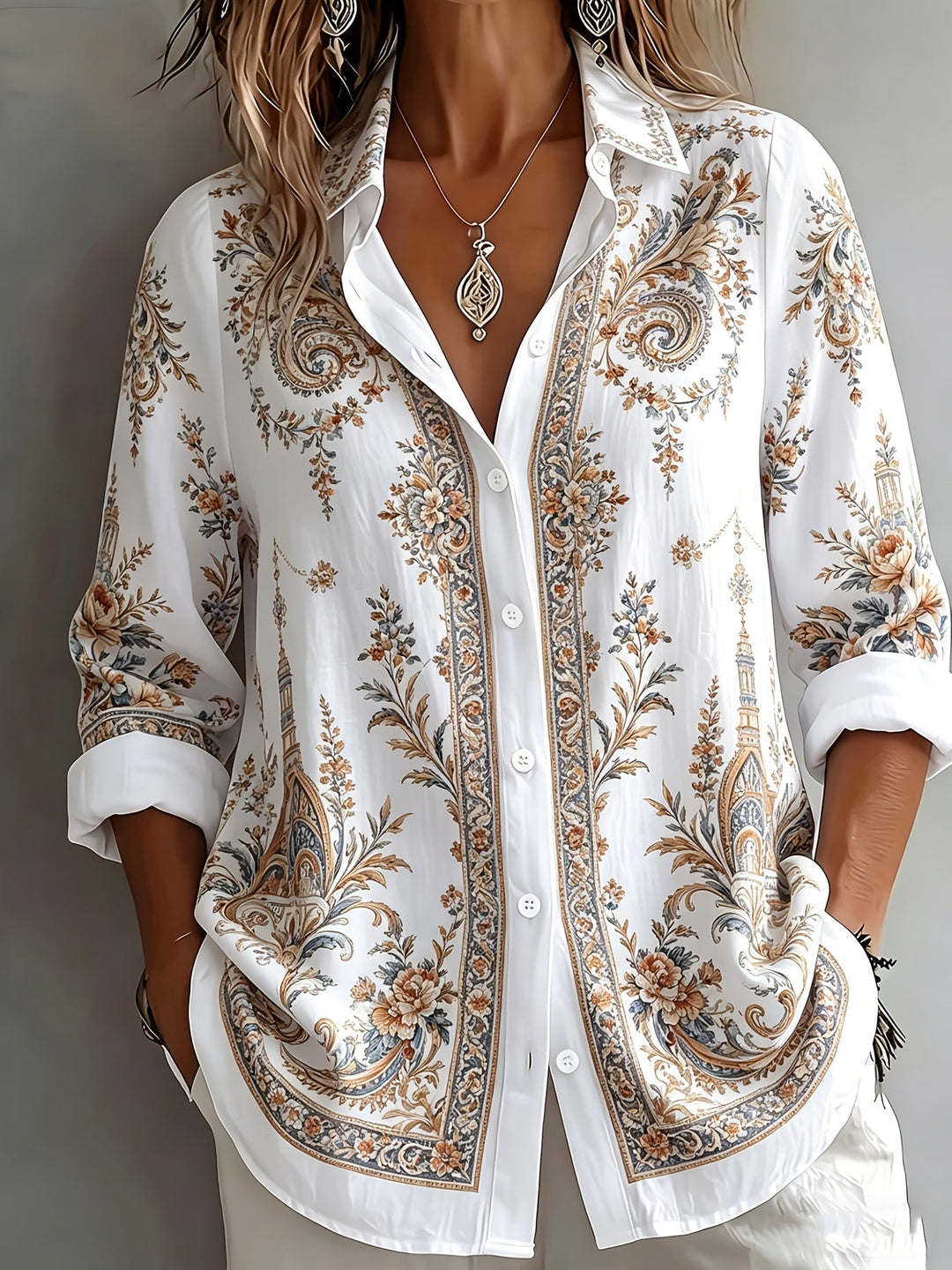 Back view: Women's floral paisley oversized long sleeve blouse, showing its relaxed, comfortable fit.