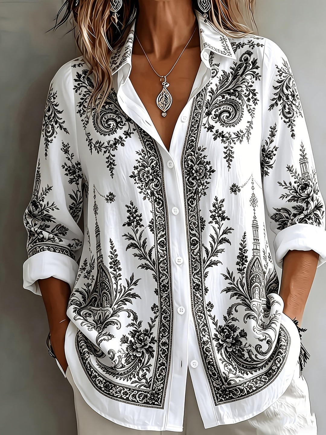 Relaxed fit women's floral paisley long sleeve top. An oversized button-down shirt for comfortable casual wear.