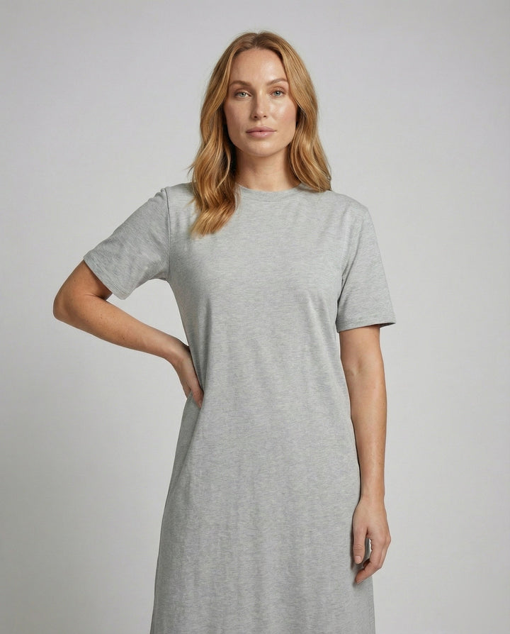 Stylish women's short sleeve mock neck maxi dress with a trendy side split, offering versatile minimalist fashion.