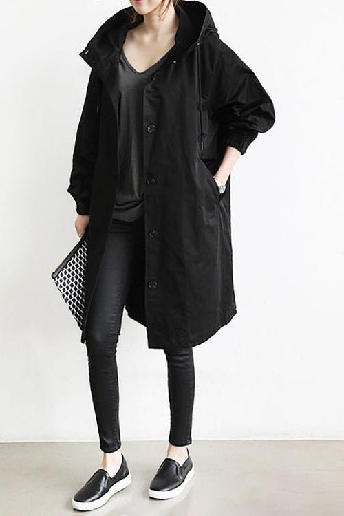 Chic women's oversized trench coat, a water resistant fall/spring parka. Perfect for stylish layering.