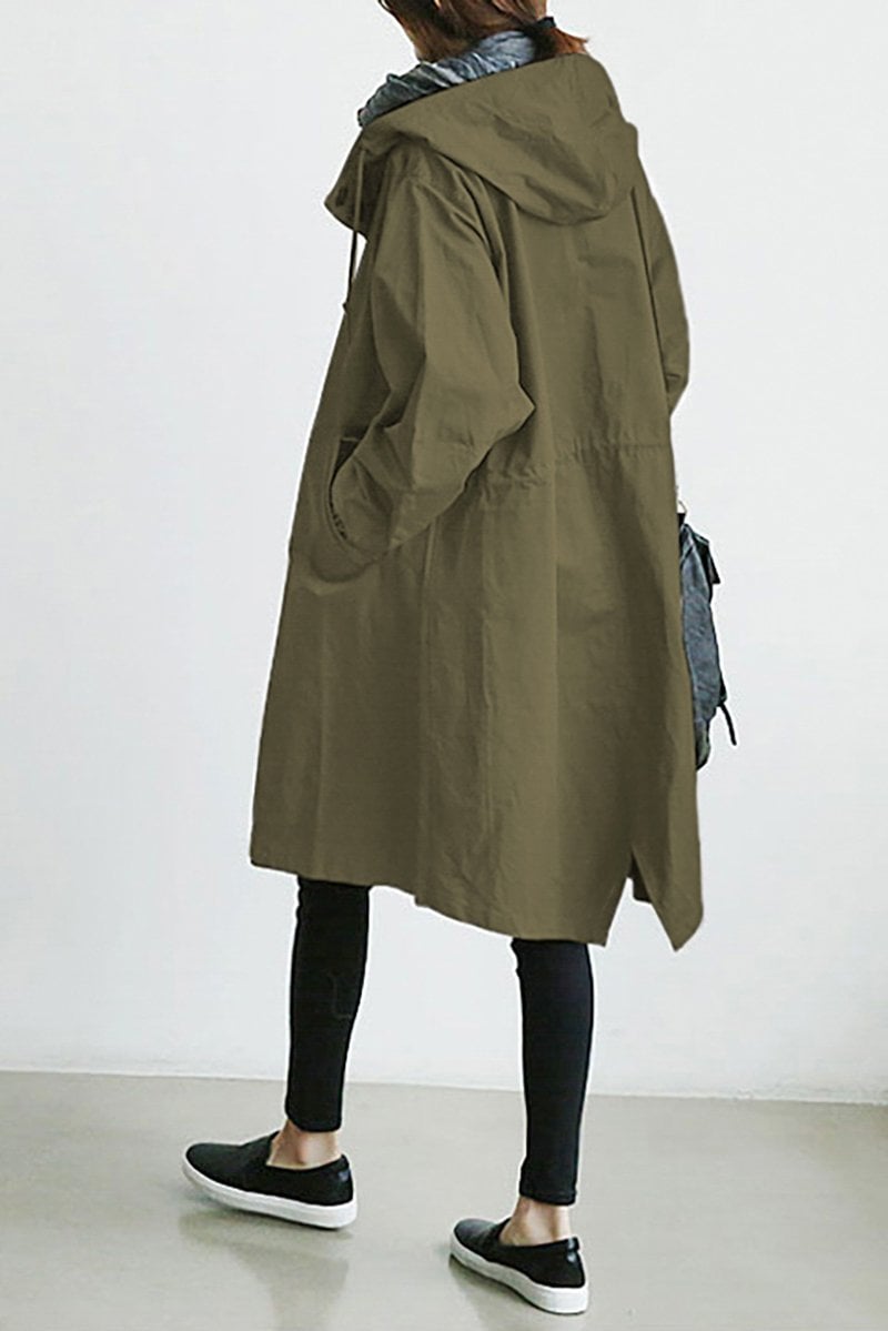 Fashionable women's rain parka, an oversized water resistant trench coat. Great for transitional weather.