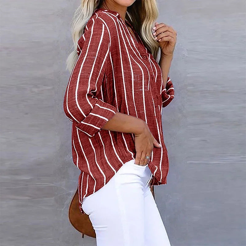 Effortless style with this women's oversized striped button-up, a comfortable casual long sleeve top.