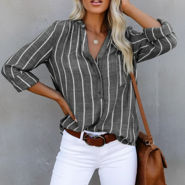 Women's long sleeve striped shirt, designed for a relaxed fit, offering both comfort and modern style.