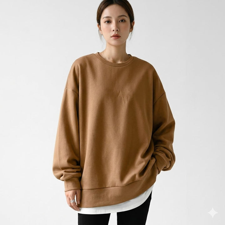 Women's oversized sweatshirt with a relaxed fit and dropped shoulders, perfect for casual everyday comfort.