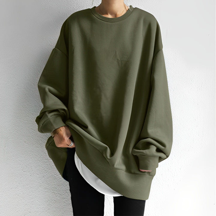Women's oversized top, a versatile casual pullover with a relaxed fit and dropped shoulder for daily style.
