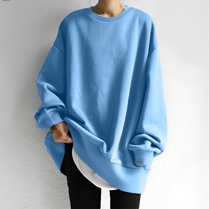 Modern women's oversized sweatshirt, featuring a relaxed fit and fashionable dropped shoulder for ultimate comfort.