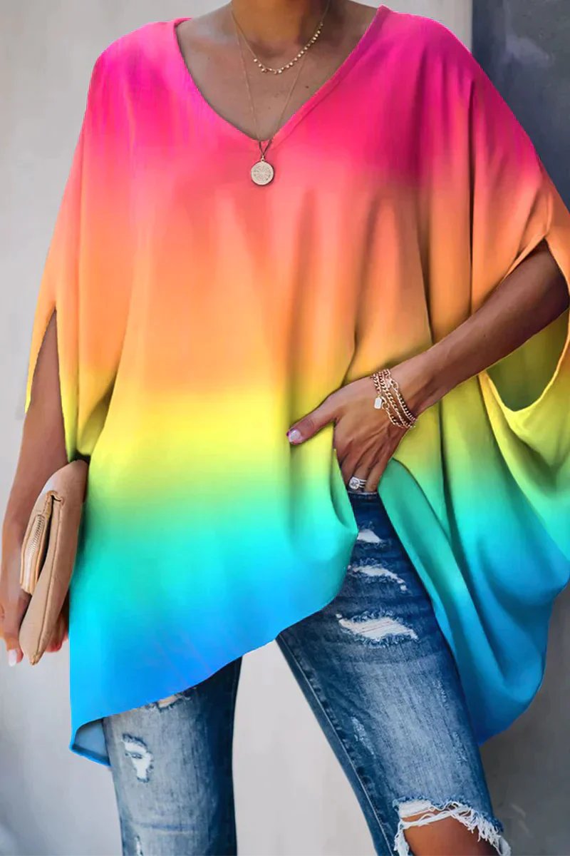 Relaxed fit women's batwing sleeve tunic top. Effortless oversized v-neck for casual comfort & everyday style.