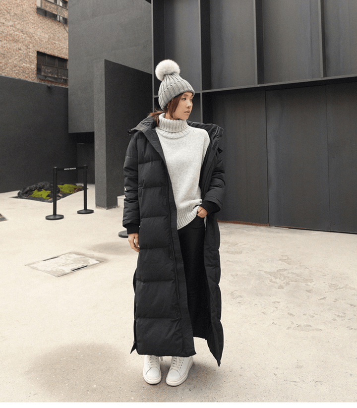 Luna oversized women's winter parka, waterproof & windproof, providing warm, stylish outerwear for cold weather.