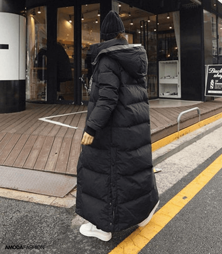 Warm & windproof women's oversized winter parka, waterproof for cold weather. A trendy, casual long jacket.