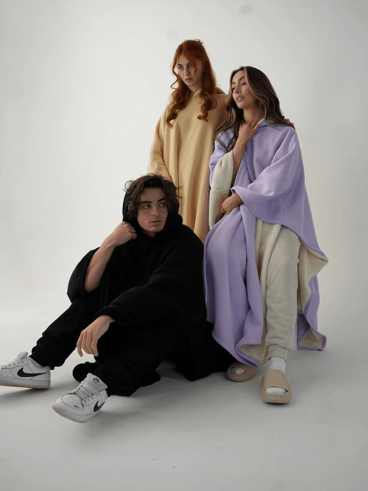 Fashionably oversized women's weighted hoodie, delivering a relaxed, cozy feel.