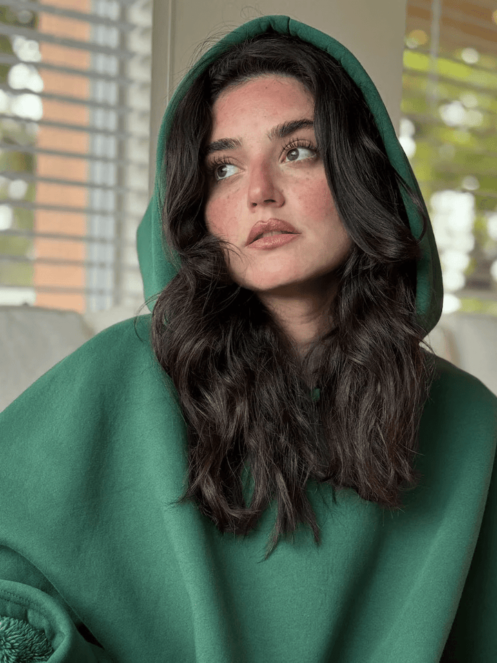 Thoughtful gift: women's oversized weighted hoodie, promoting calm & comfort.