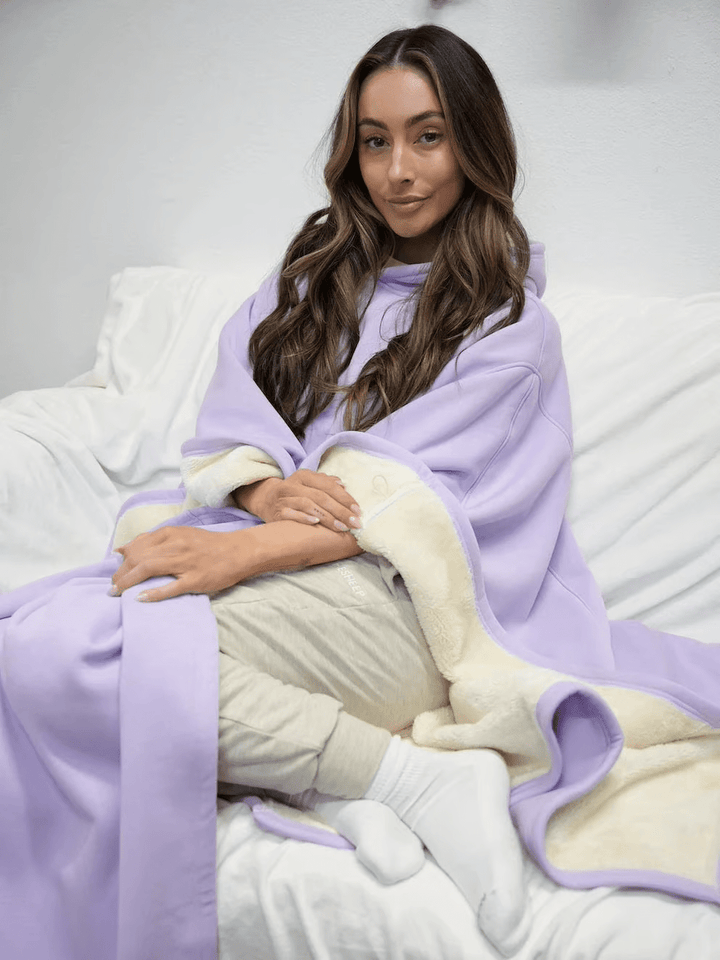Experience deep comfort with this women's oversized weighted hoodie, perfect for relaxing.