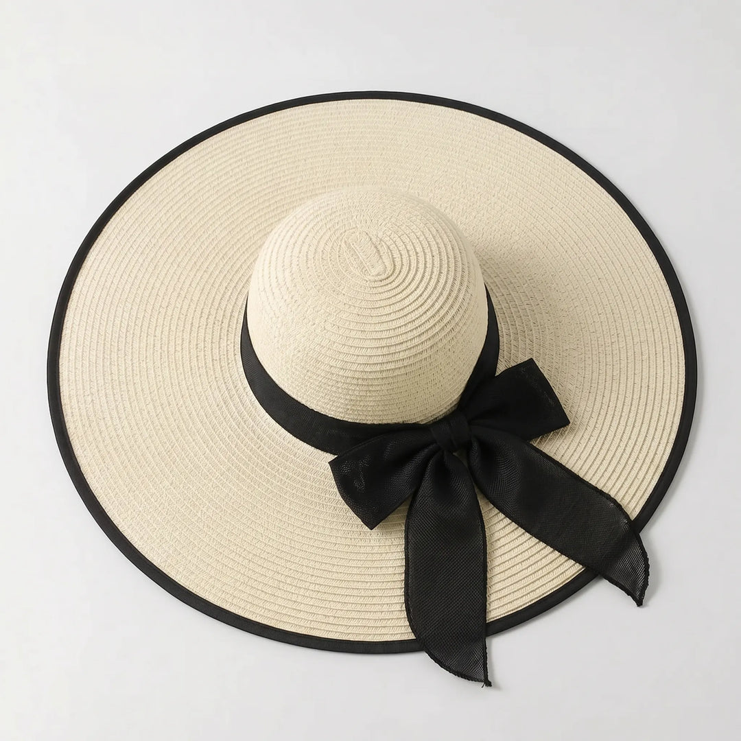 Large oversized wide brim sun hat for women, ideal for beach, travel, and superior sun protection.