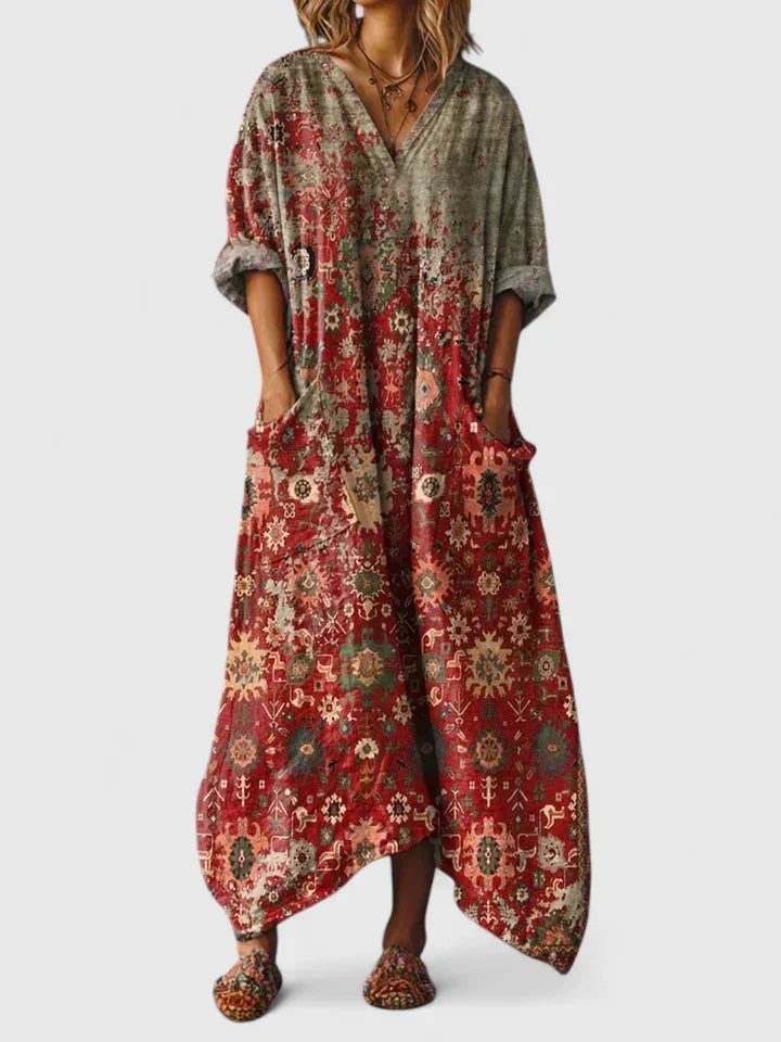 Women's paisley boho maxi dress with V-neck, patch pockets, and flowing design. Ideal for casual summer wear.