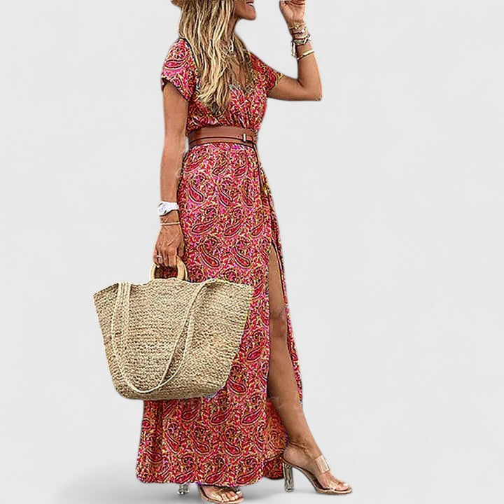 Comfortable women's V-neck paisley maxi dress with short sleeves and a belted waist, perfect for casual elegance.
