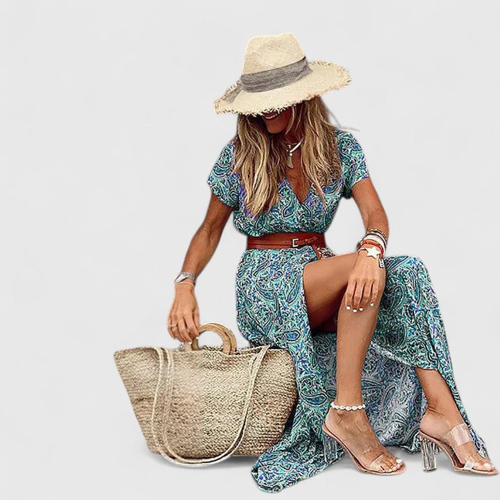 Stylish women's paisley print boho maxi dress, V-neck, short sleeves, and belted silhouette for summer vacations.
