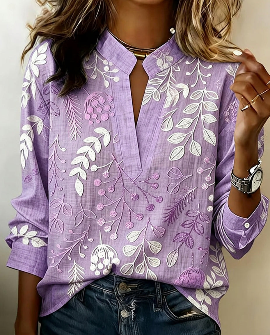 Women's pastel floral V-neck blouse, perfect for spring fashion & versatile everyday wear.
