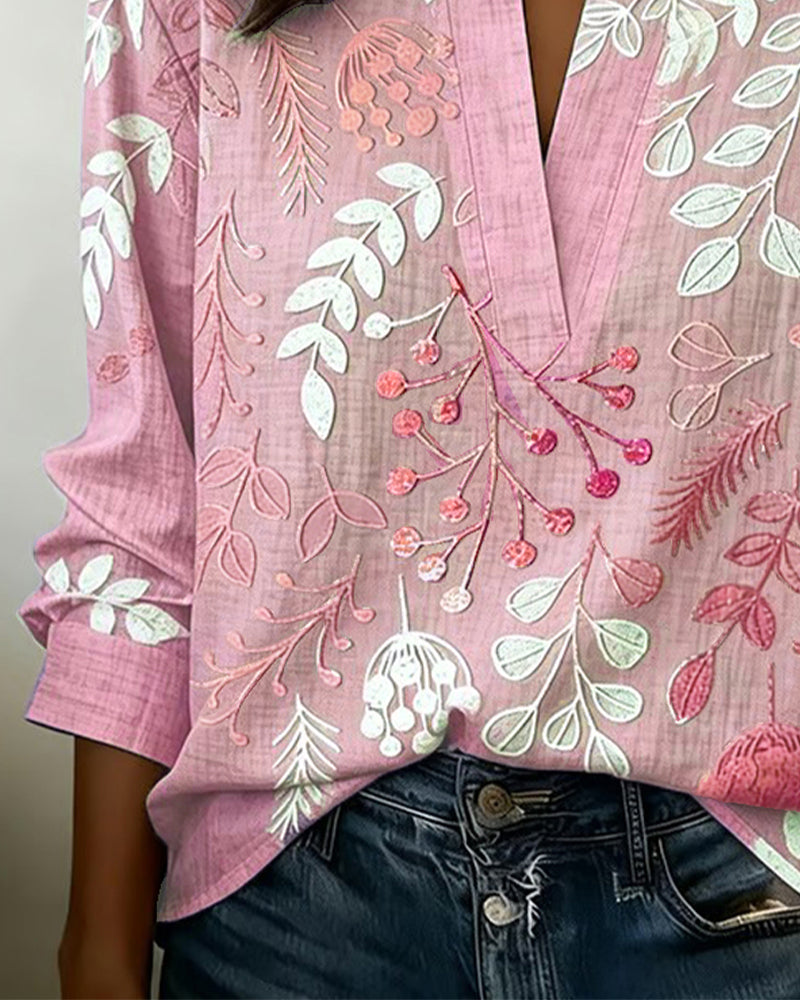 Work-appropriate women's pastel floral V-neck blouse, transitions perfectly to weekend wear.