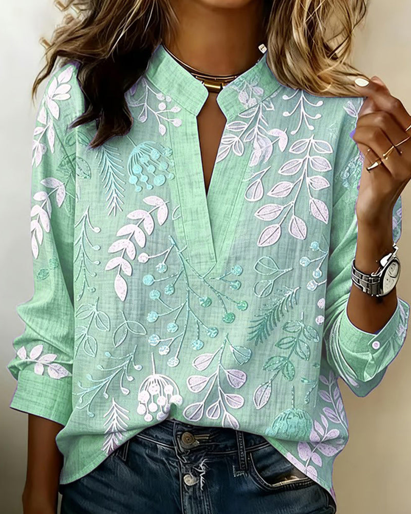 Feminine women's long sleeve pastel floral V-neck top, perfect for a delicate spring outfit.