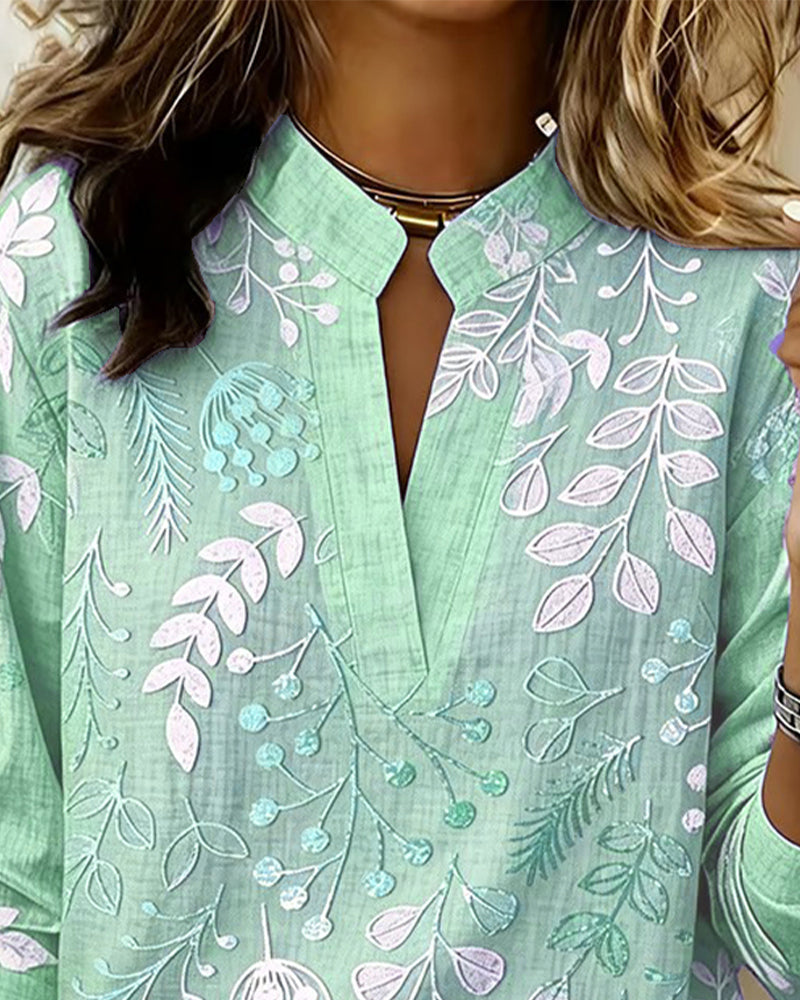 Soft & comfortable women's pastel floral V-neck blouse, combining style with ease for any occasion.
