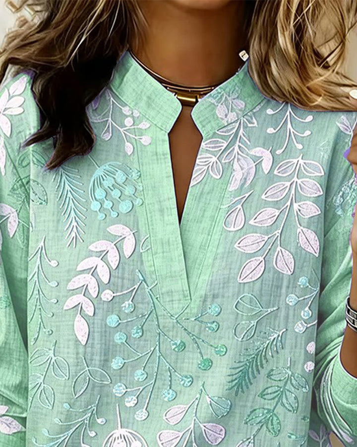 Soft & comfortable women's pastel floral V-neck blouse, combining style with ease for any occasion.