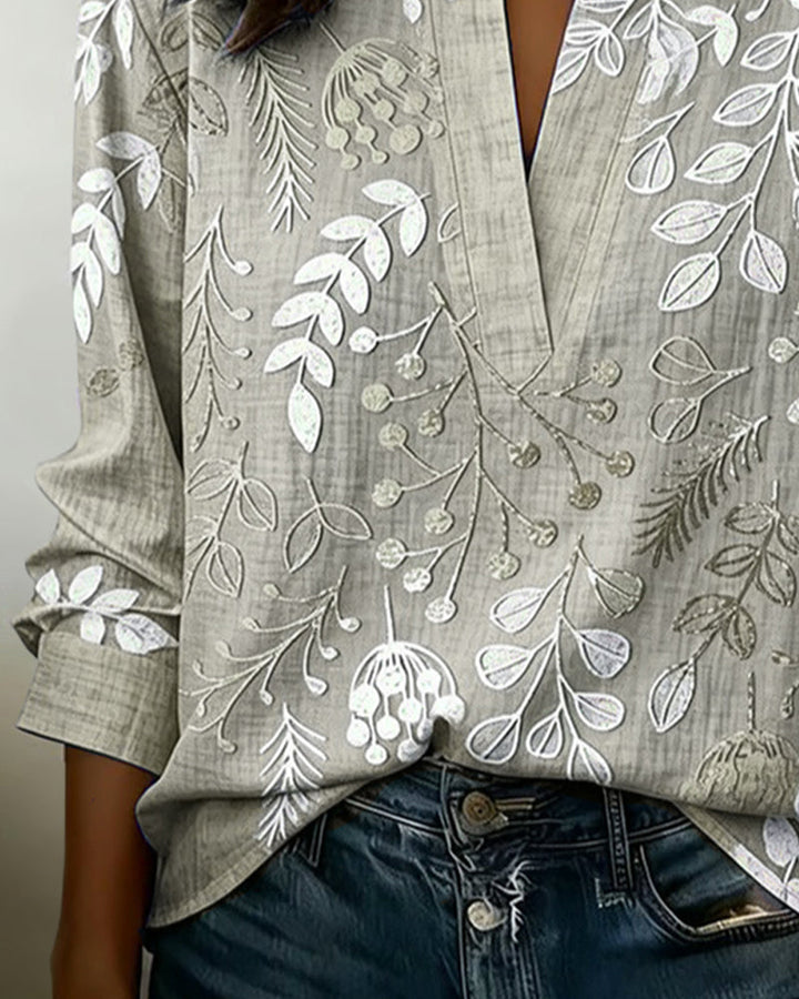 Fresh pastel floral V-neck blouse, a women's top designed for sunny spring and summer days.