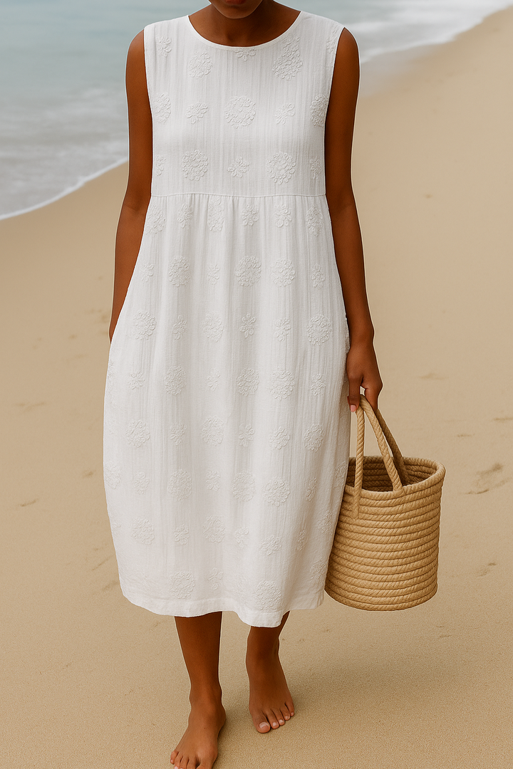 Stylish women's sleeveless midi dress with unique pattern. Versatile for casual summer days or everyday comfort.
