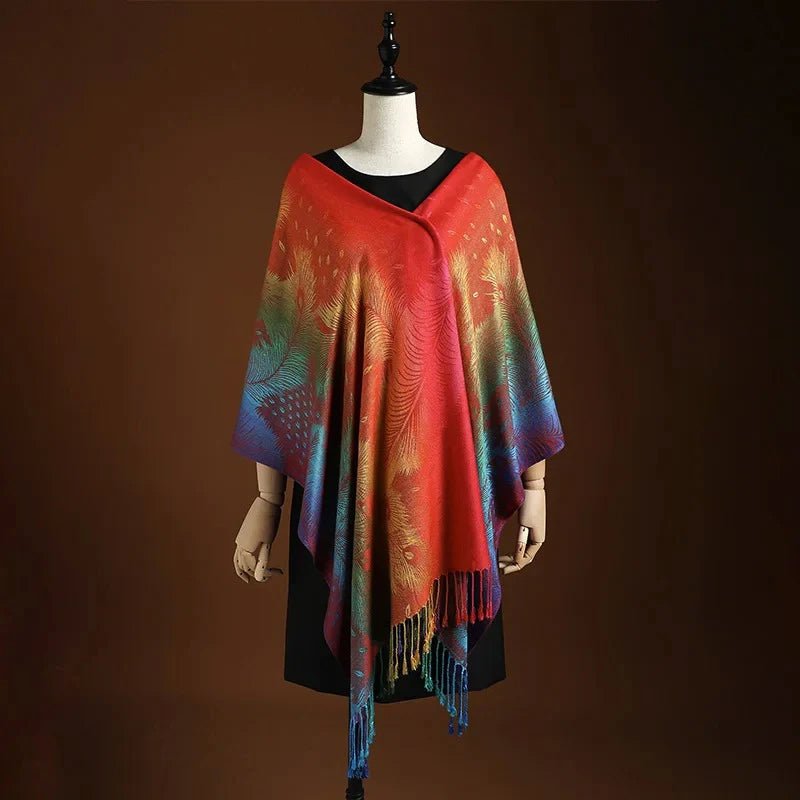 Elegant women's shawl featuring vibrant peacock pattern & bohemian fringe. Soft, versatile wrap for any occasion.
