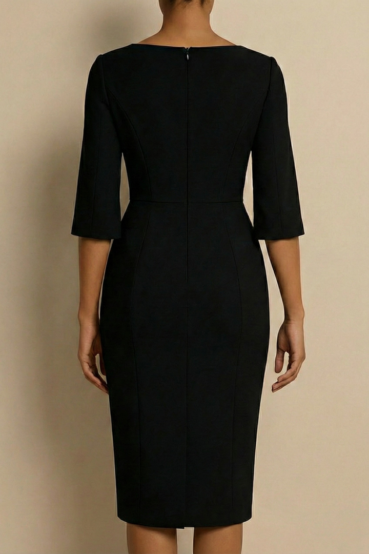 Elegant women's fitted midi dress featuring delicate pearl trim and stylish split sleeves for special occasions.