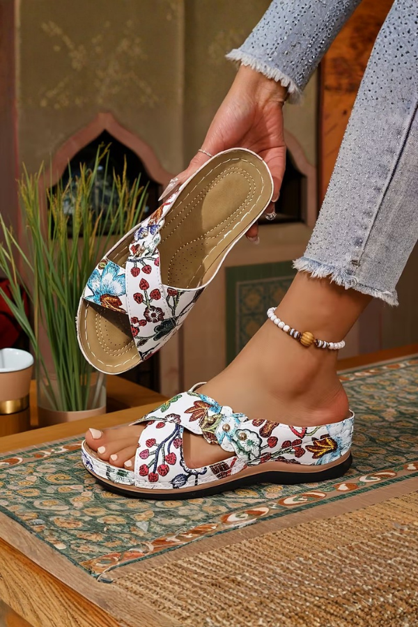 Women's perforated wedge slip-on sandals, ideal comfort shoes for summer everyday wear.