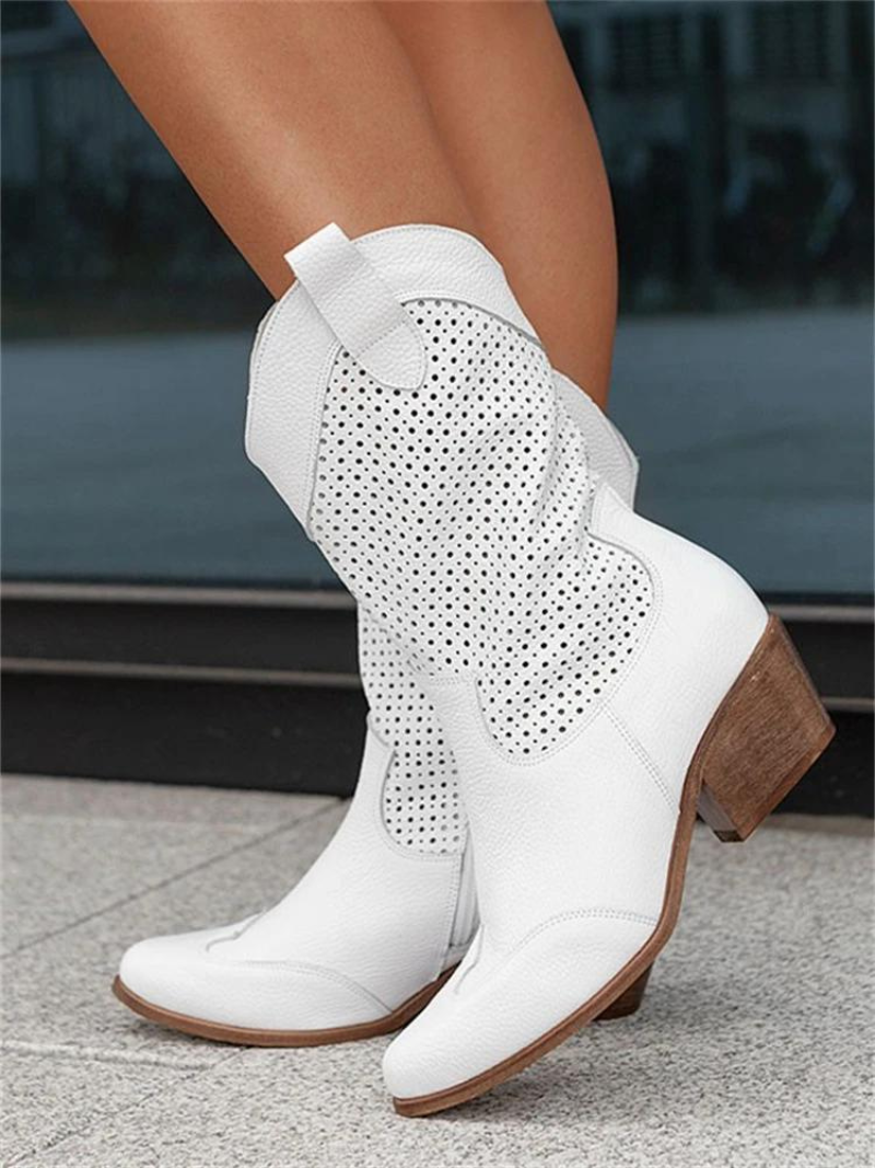 Women's perforated western mid-calf boots with pointed toe & low heel. Trendy cowboy fashion footwear.