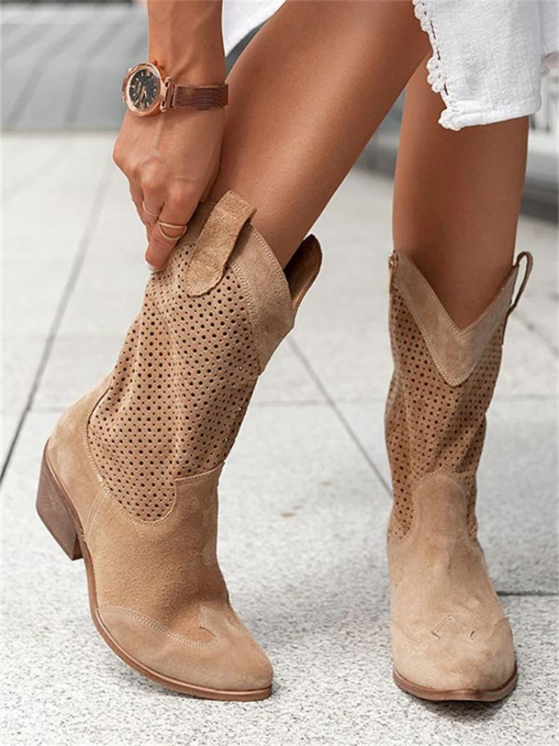 Trendy women's cowboy fashion boots: perforated mid-calf design, pointed toe, and sturdy low heel for daily wear.